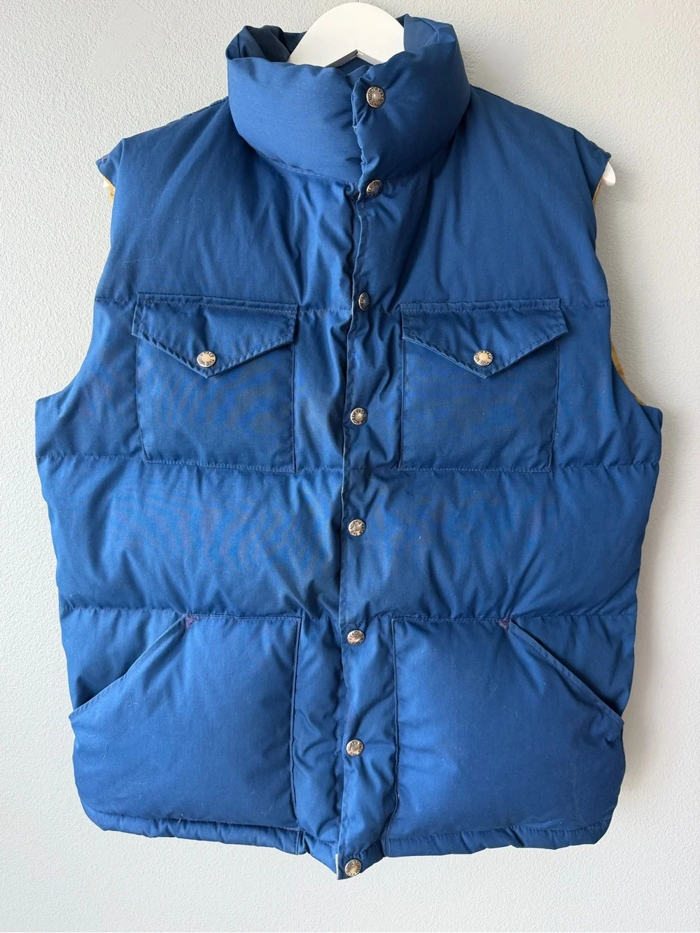 The North Face vintage blue goose down fill snap up puffer vest Men’s sz L